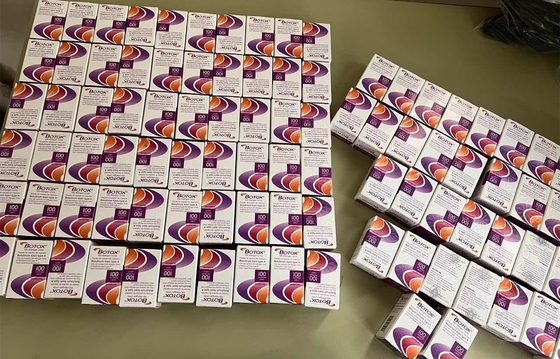 La cara y los hombros finos antis de  Botulax de la arruga del músculo mecanografían 100 unidades
